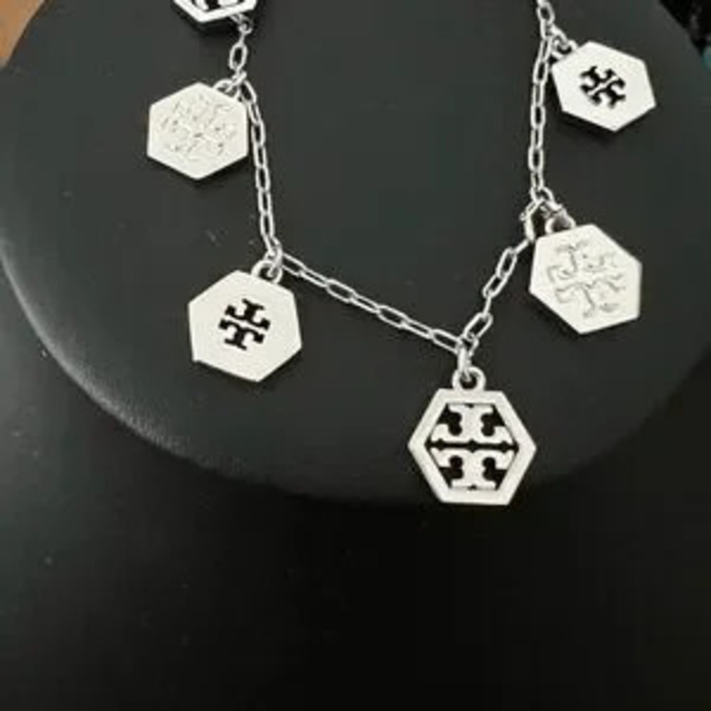 TORY BURCHGoldtone geometrical logo Earrings